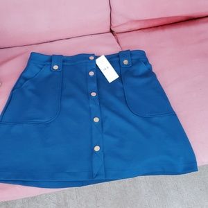 Skirt blue with pockets and metalic buttons